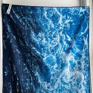 House of clouds waves thin towel
